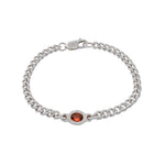 A silver chain bracelet with a small oval amber gemstone centerpiece, displayed on a clean white background.
