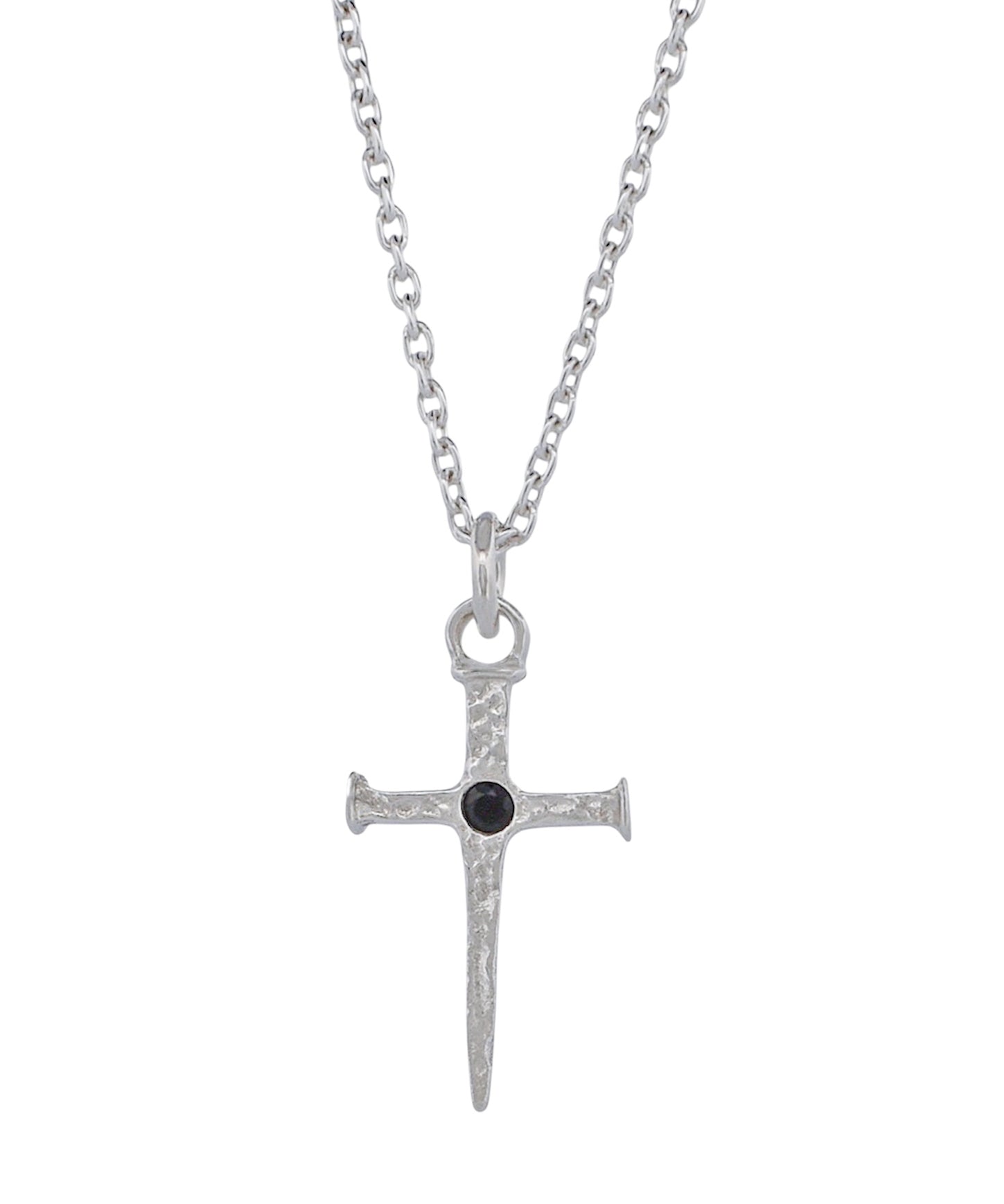 A silver cross pendant necklace with a small black gemstone at the center, suspended from a silver link chain against a plain white background.