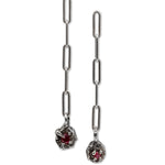 Pair of silver chain earrings with gemstone drops on a white background