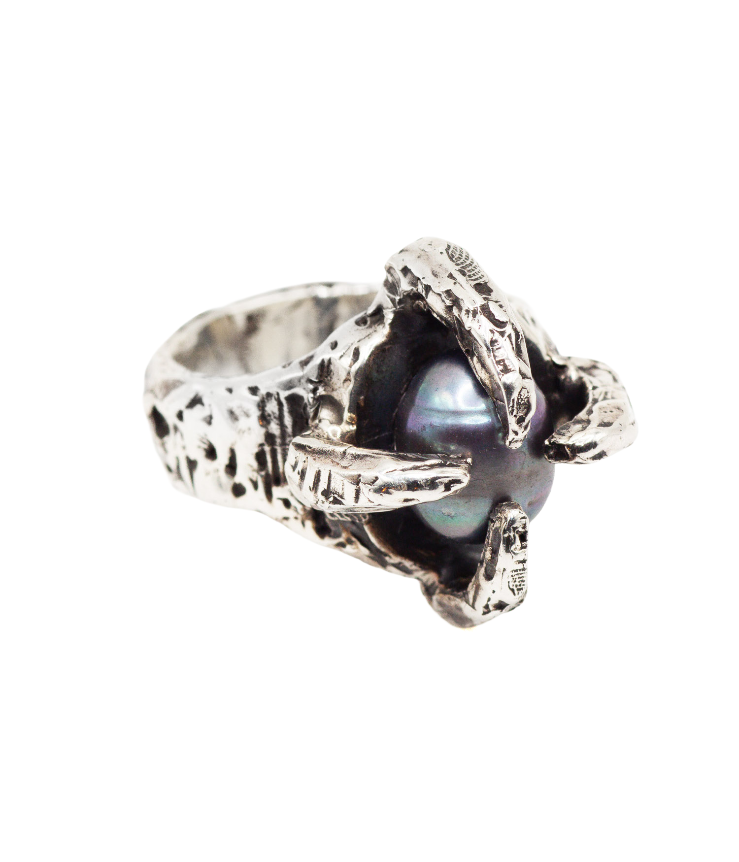 Silver ring with a central pearl on a white background