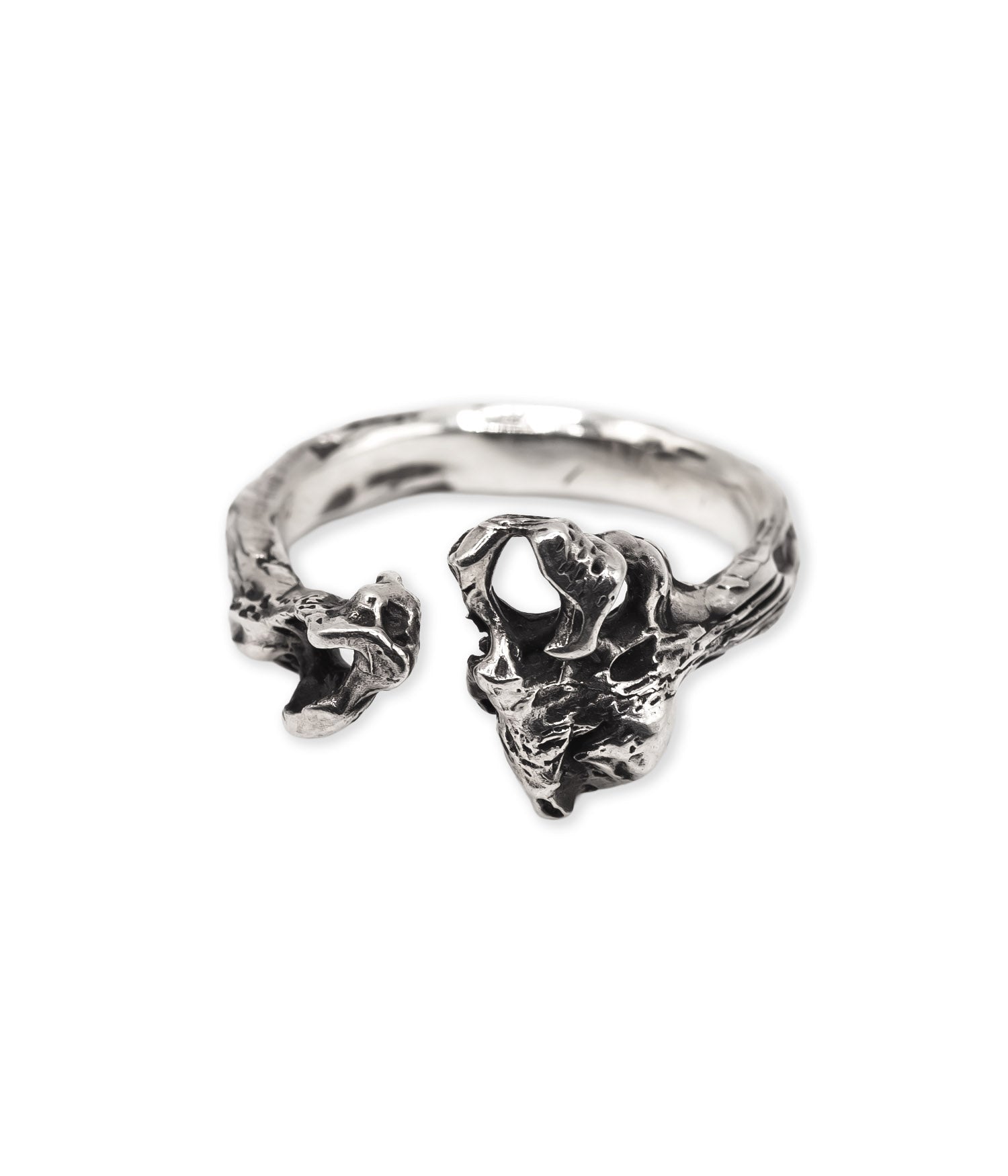 Silver openwork ring on a white background