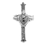 Silver cross-shaped ring with intricate designs on a white background