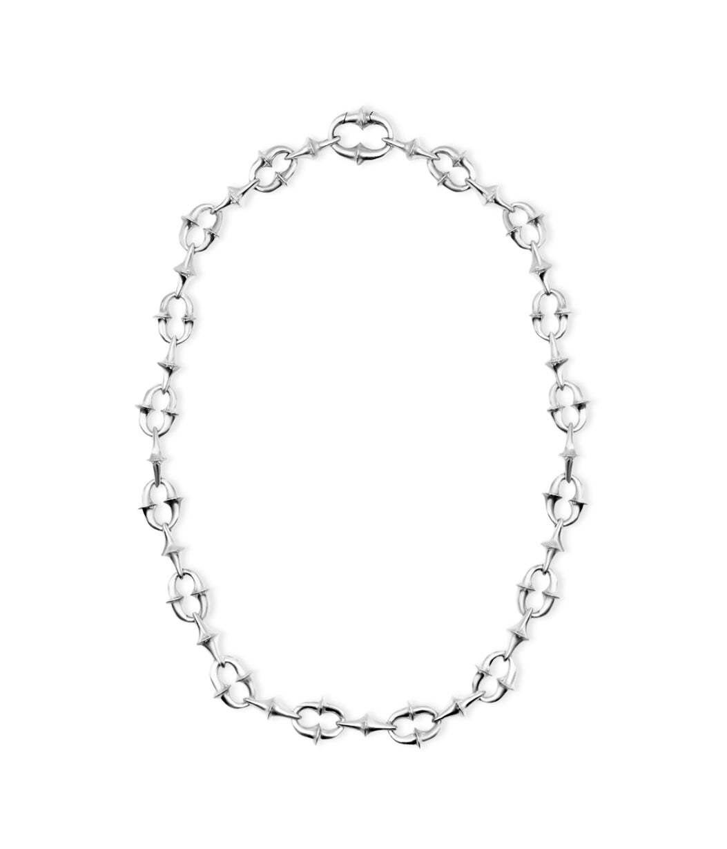 Silver chain necklace on a white background