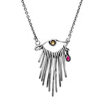 Necklace with a fringe pendant and gemstones on a white background