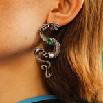 Close-up of an ear with a decorative earring