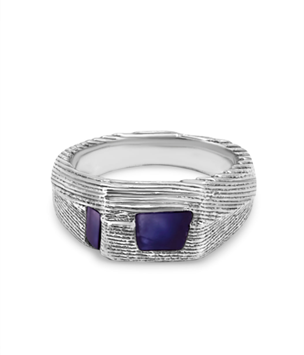 Silver ring with two purple stones on a white background