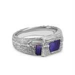 Silver ring with purple stones on a white background