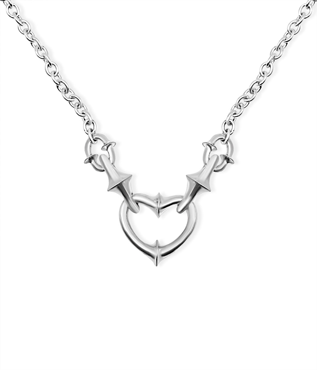 Silver necklace with heart and arrow design on a white background