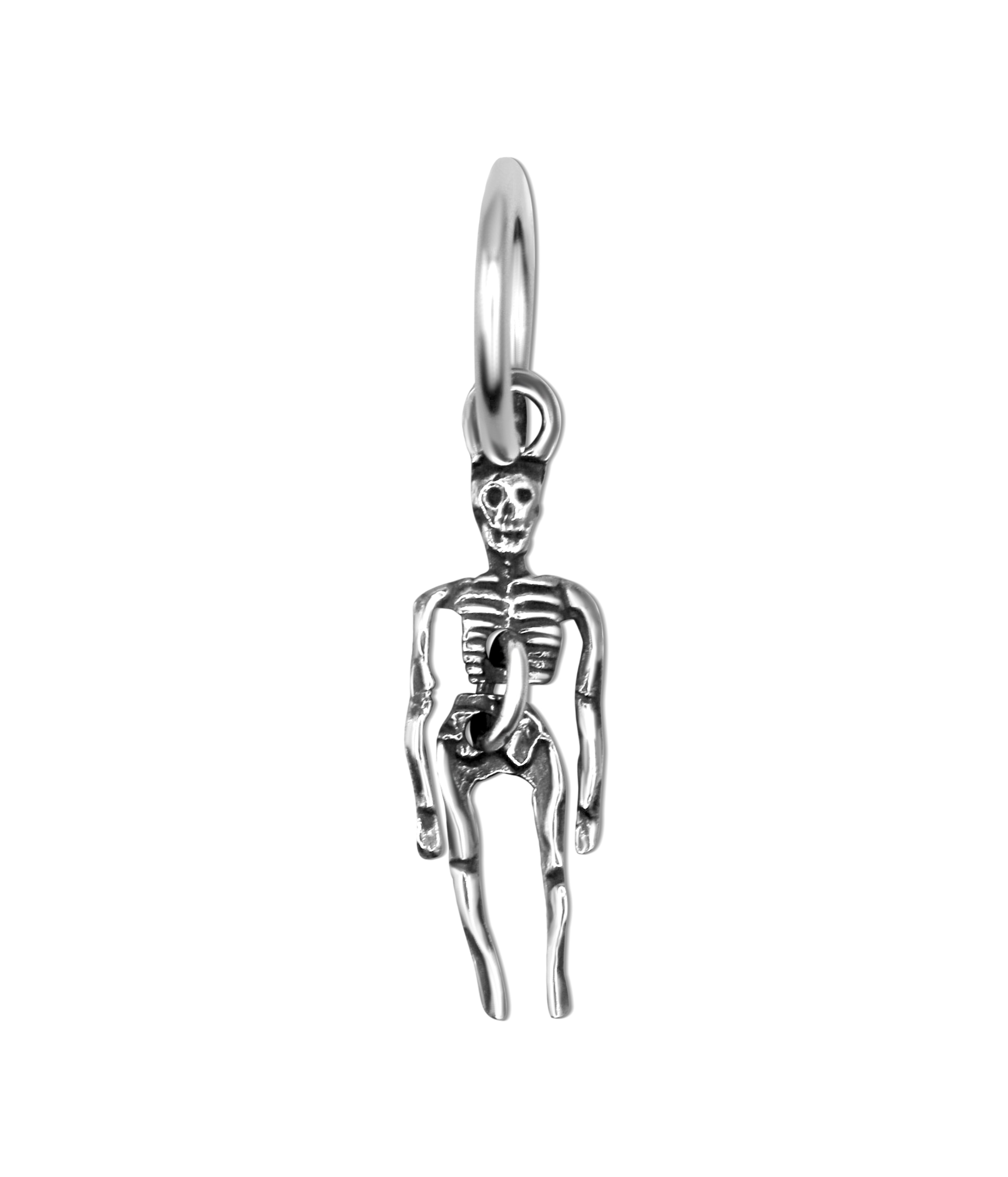 Silver skeleton pendant on a white background