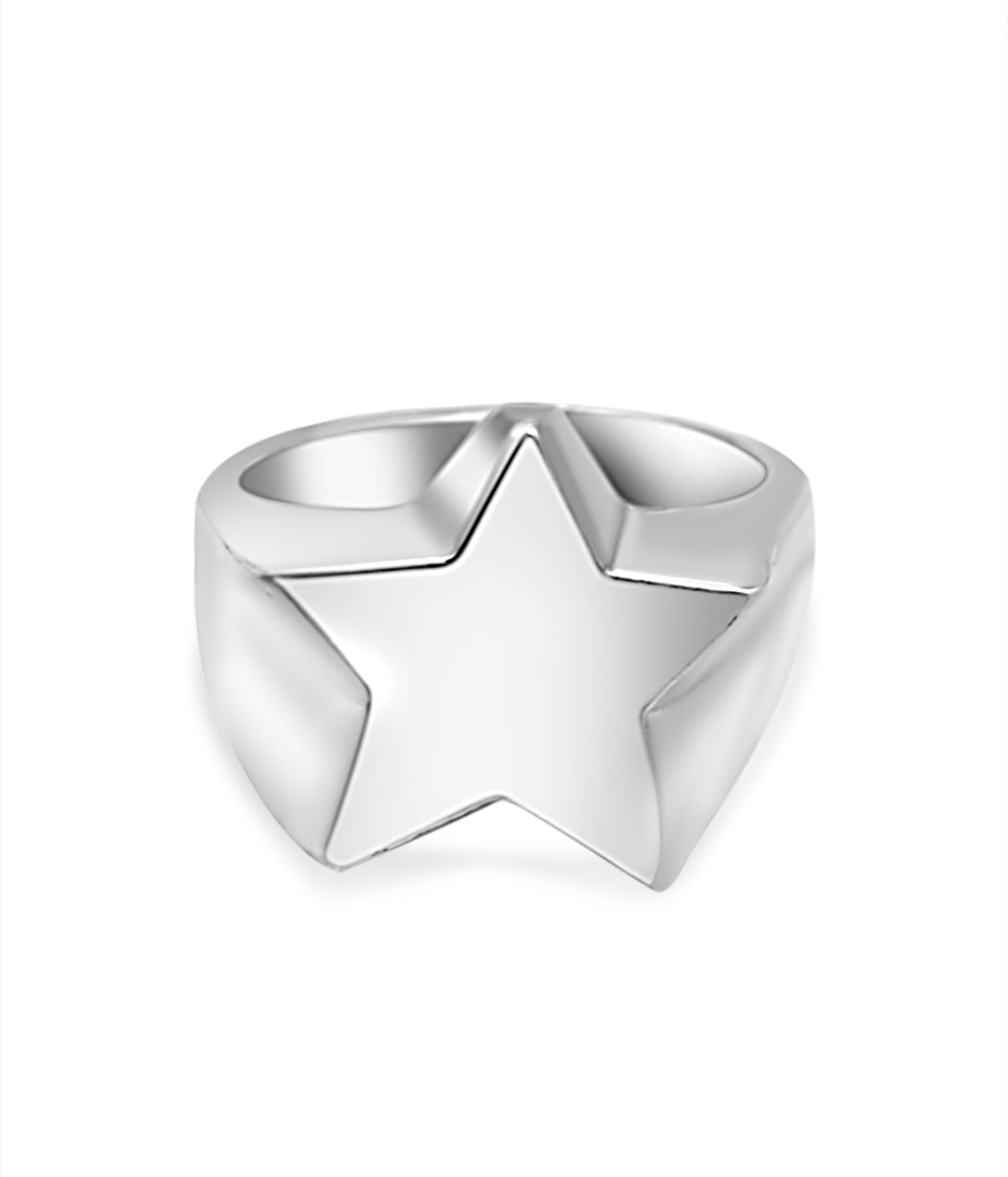 Silver star-shaped ring on a white background