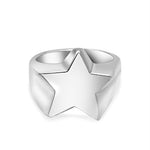 Silver star-shaped ring on a white background