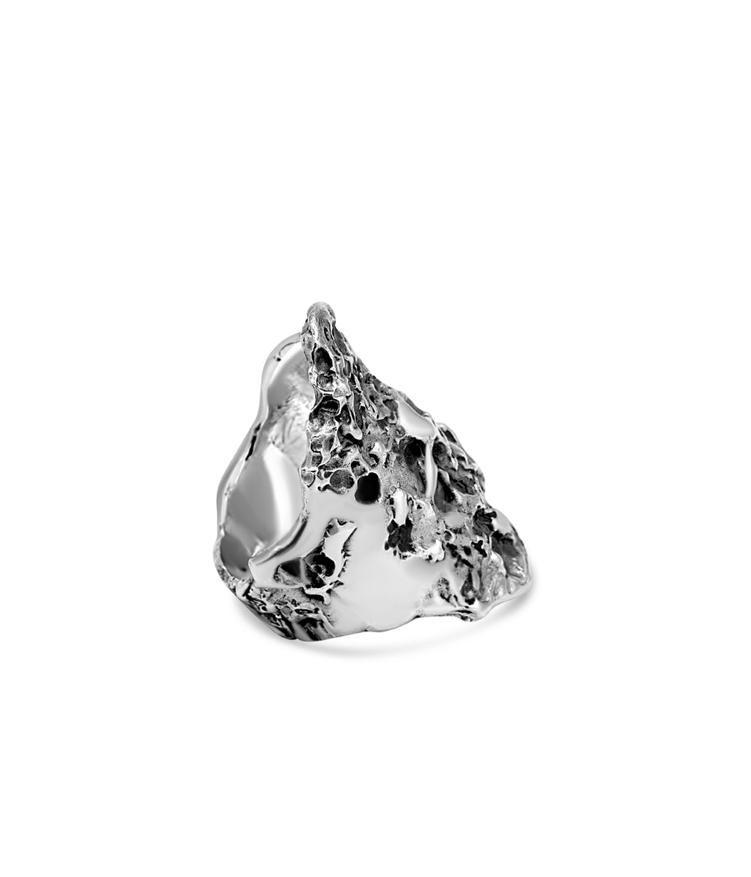 Silver ring with a textured design on a white background