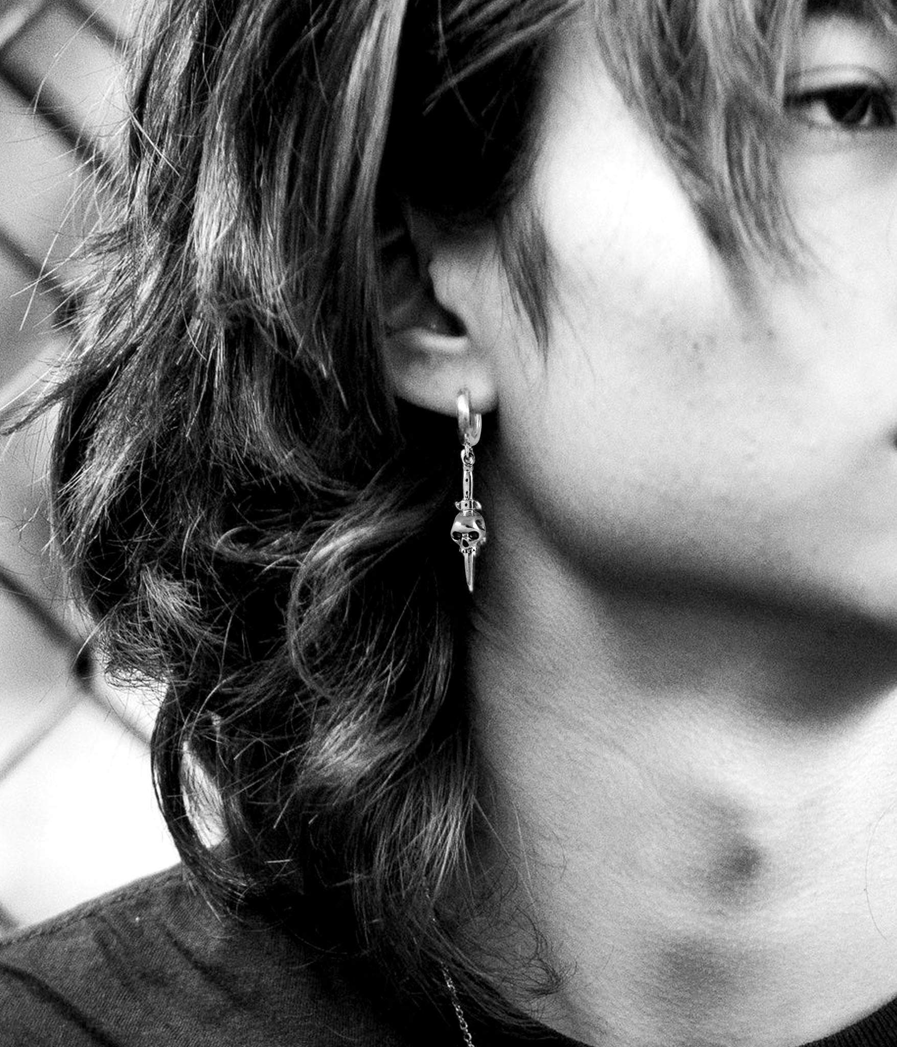 Switchblade Skull Earring on Model 