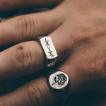 chunky silver rings on mens hand