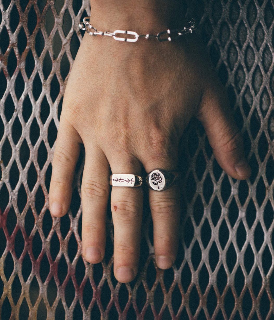 chunky silver rings on hand