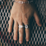 chunky silver rings on hand