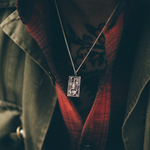 scorpion pendant necklace on model
