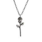 A silver rose pendant necklace on a matching silver link chain, shown against a plain white background.