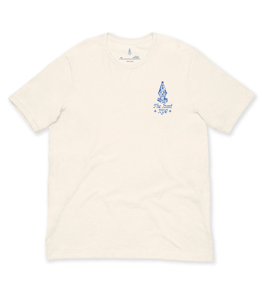 Beige t-shirt with blue graphic design on a white background