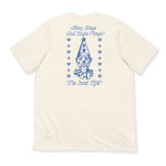 Beige t-shirt with blue graphic and text on a white background