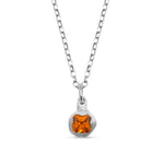 Silver necklace with a pendant featuring an orange gemstone on a white background