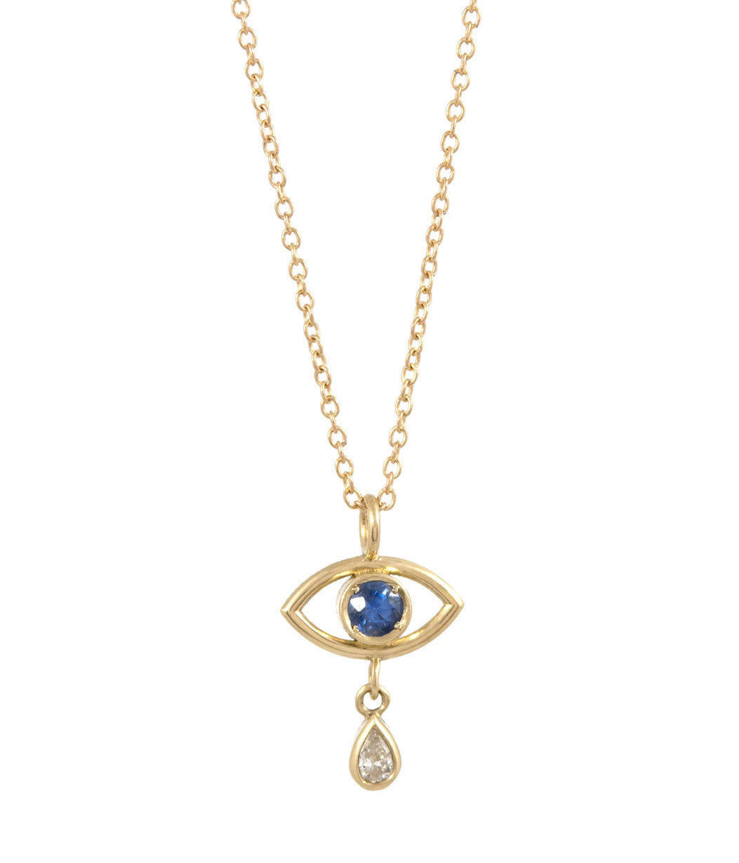Gold necklace with eye-shaped pendant featuring a blue gemstone and teardrop charm on a white background