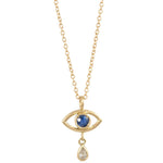 Gold necklace with eye-shaped pendant featuring a blue gemstone and teardrop charm on a white background
