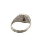 Silver ring with a unique design on a white background