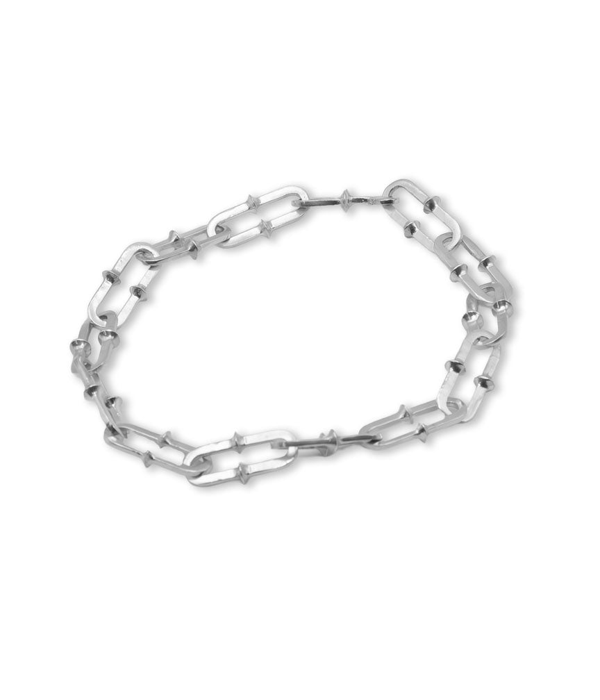 Silver chain bracelet on a white background