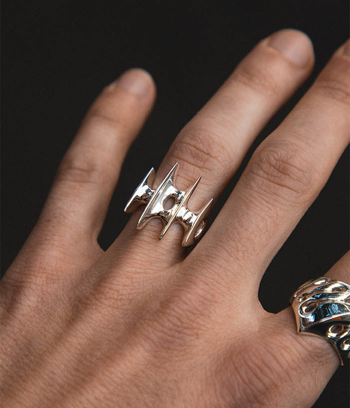 blade ring on male hand 