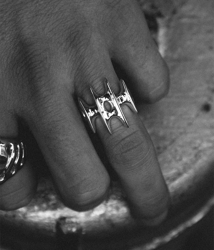 blade ring on male hand 