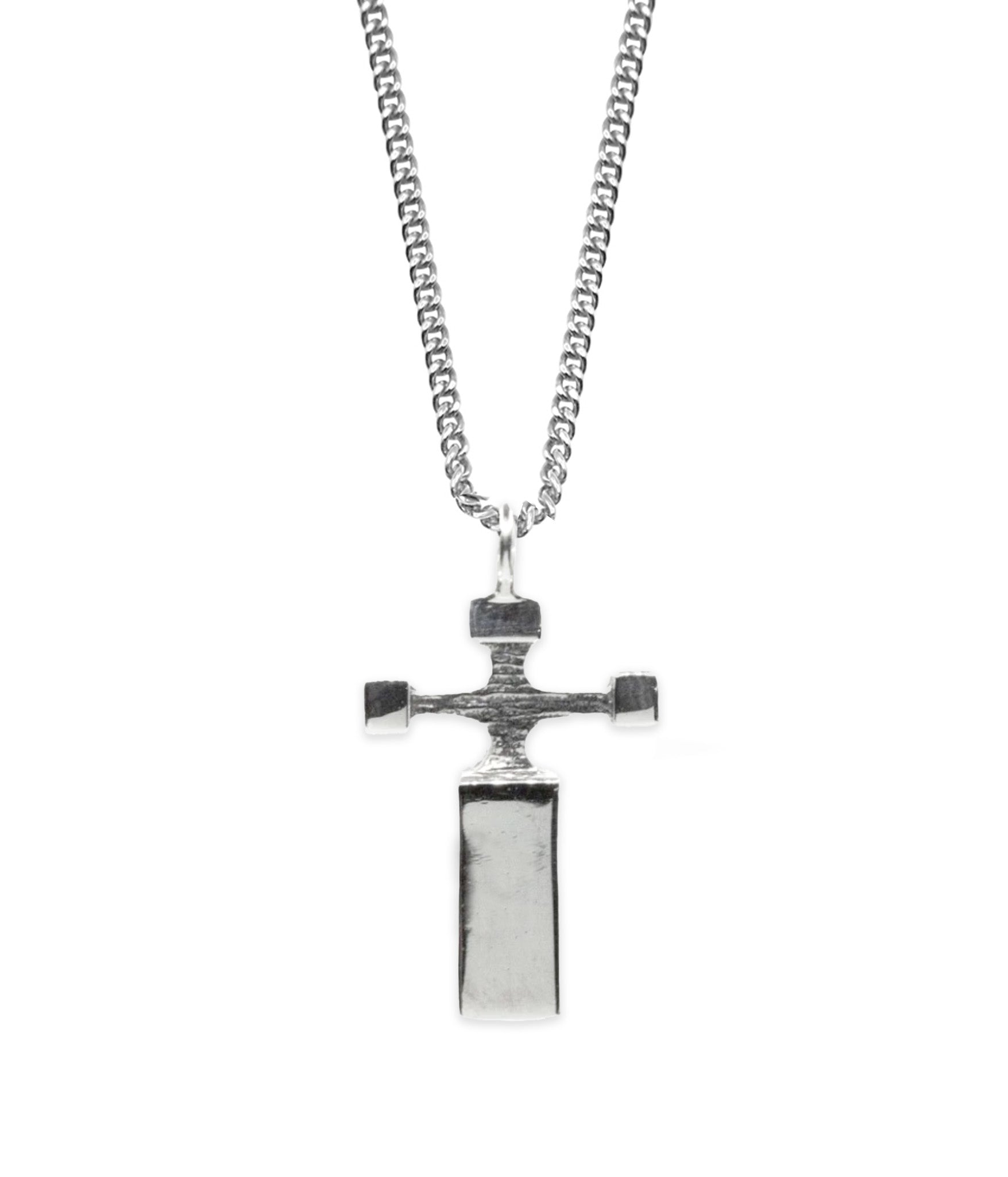 Silver cross pendant necklace on a white background