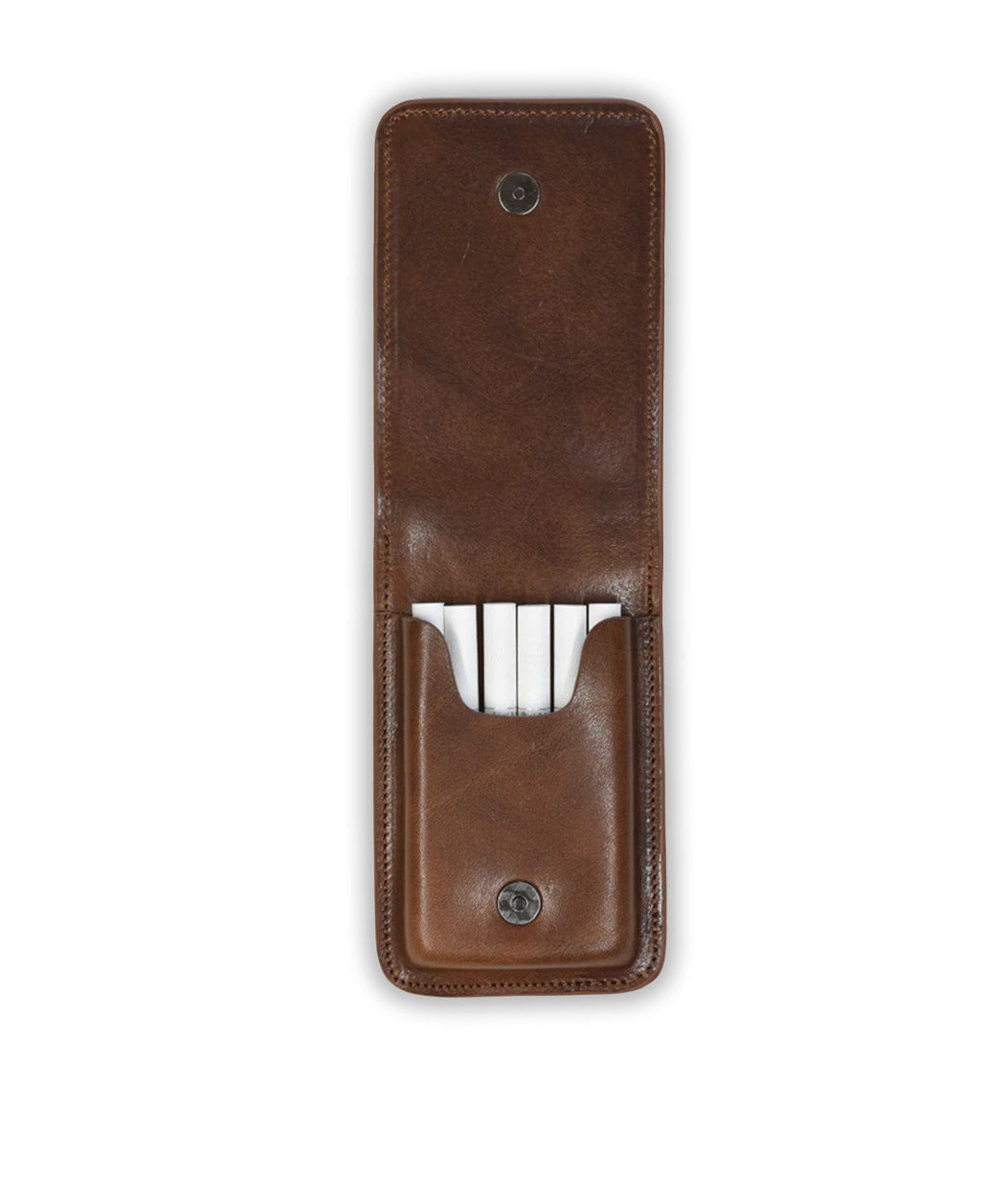 Brown leather wallet with silver card holder on a white background