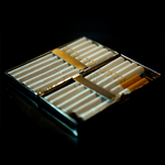 Cigarette pack with cigarettes on a dark background