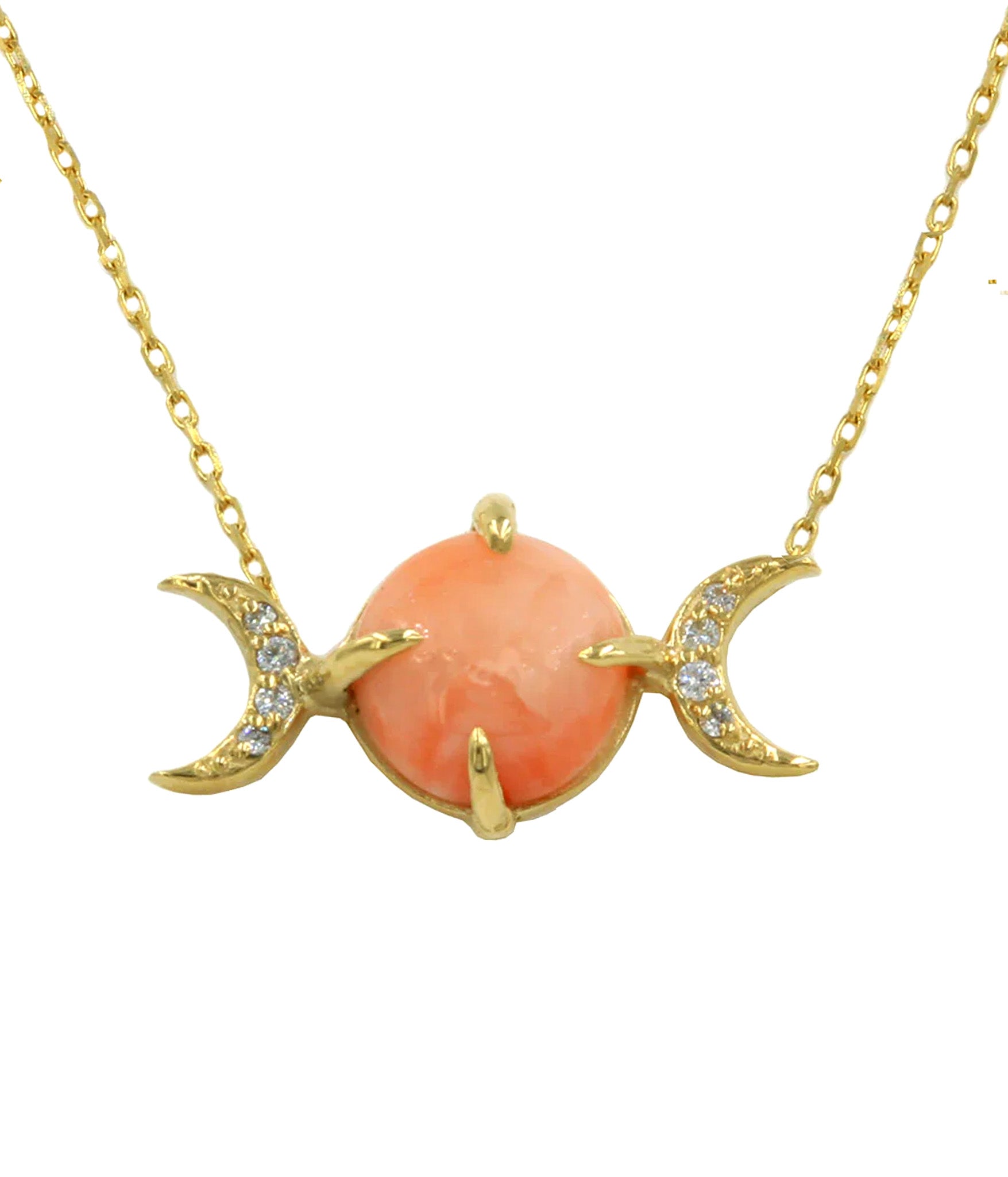 Necklace with a pink stone and gold crescent moon designs on a white background