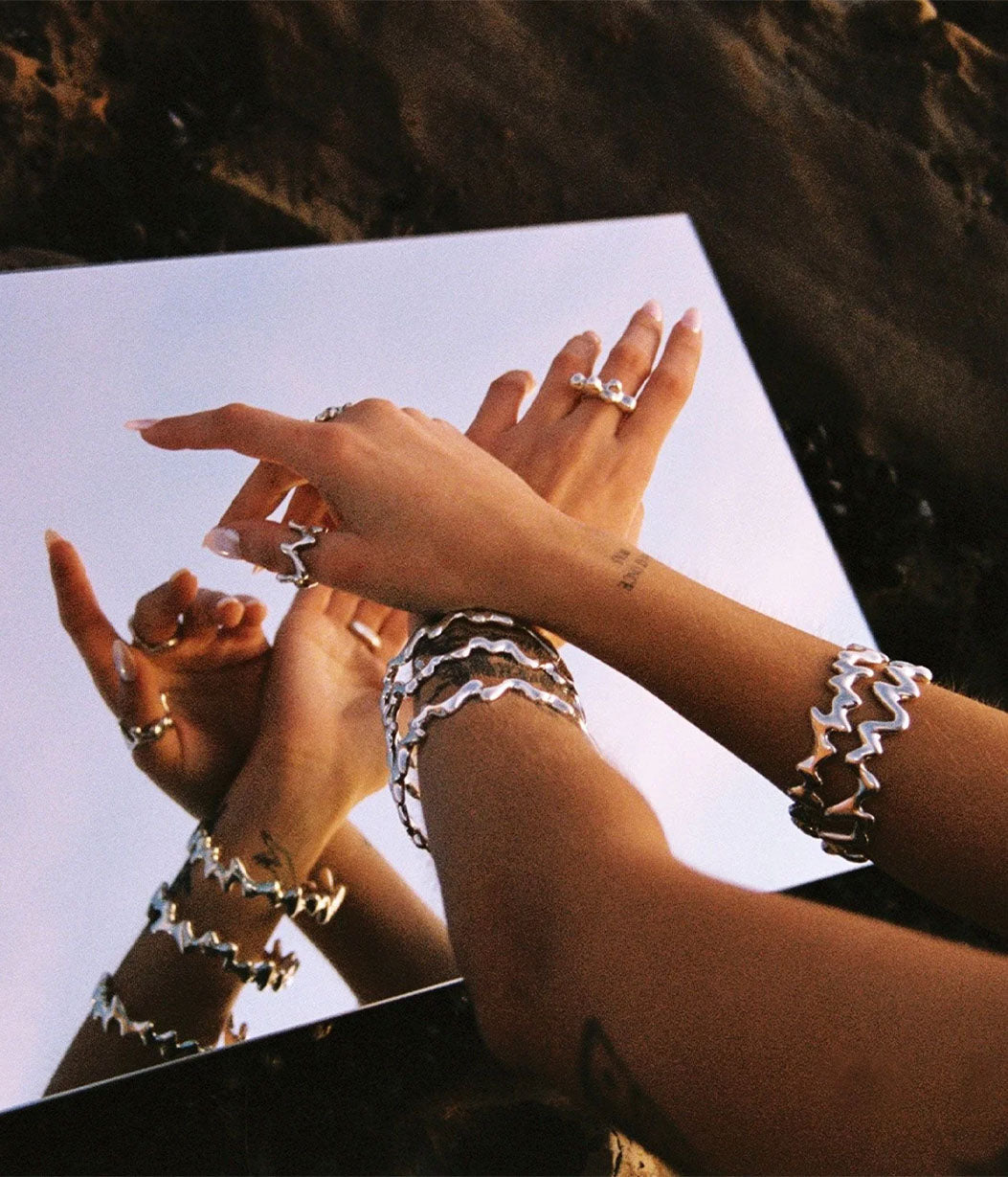 drip bangle on wrist