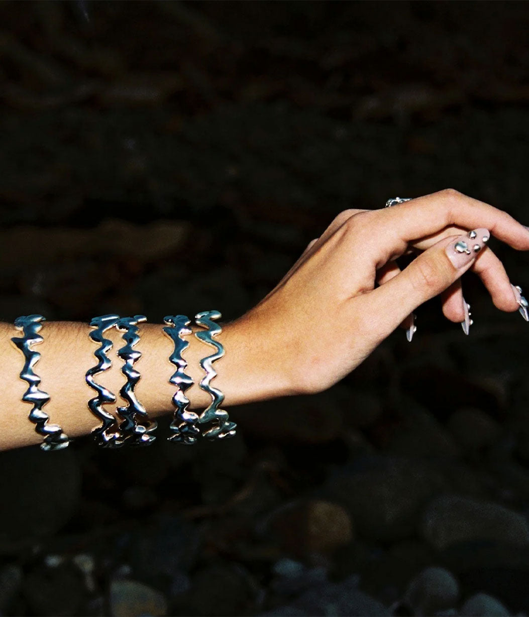 drip bangles on wrist