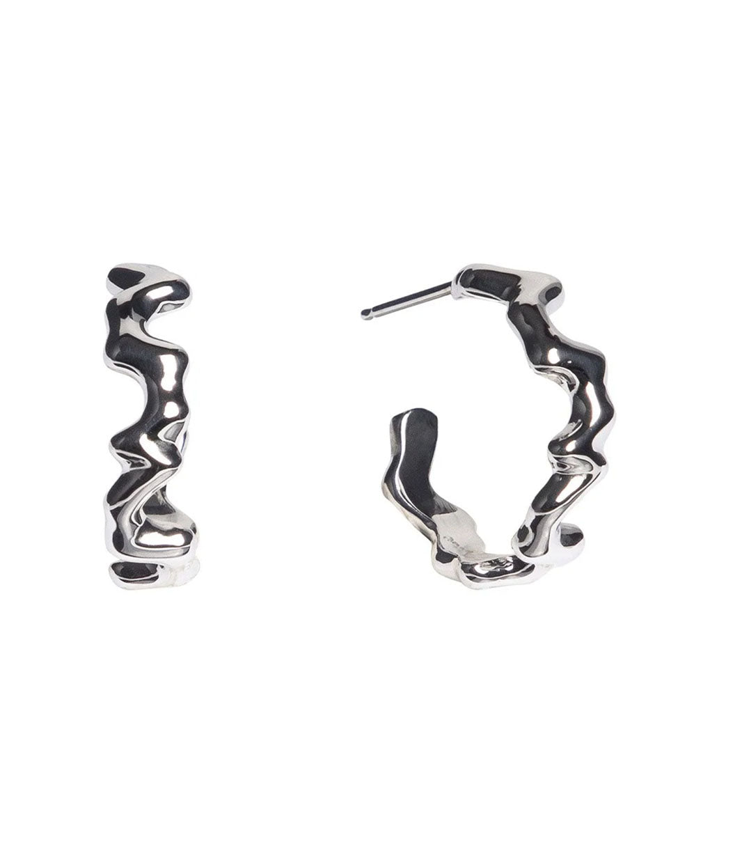 Silver hoop earrings on a white background