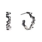 Silver hoop earrings on a white background