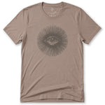 A taupe brown short-sleeve crewneck t-shirt featuring a dark gray line art graphic of an eye surrounded by radiating lines on the chest, displayed flat against a white background.