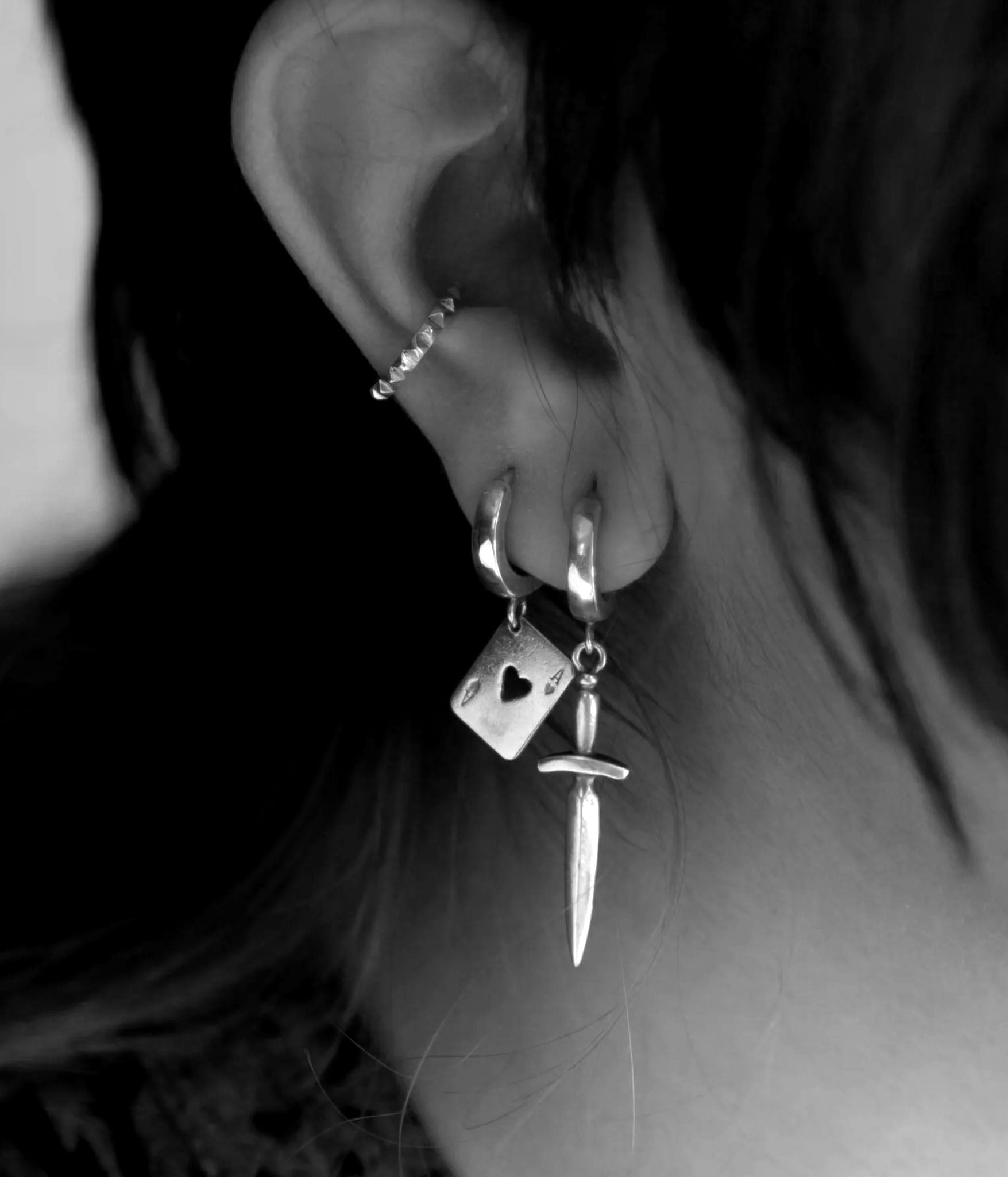 Sterling Silver Ace of Spades Hoop Earring pendant on model 