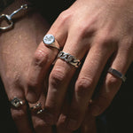 Closeup of THE HUNT NYC FUTABA Cuban Ring worn on model's finger, showcasing polished silver finish and handcrafted chain design