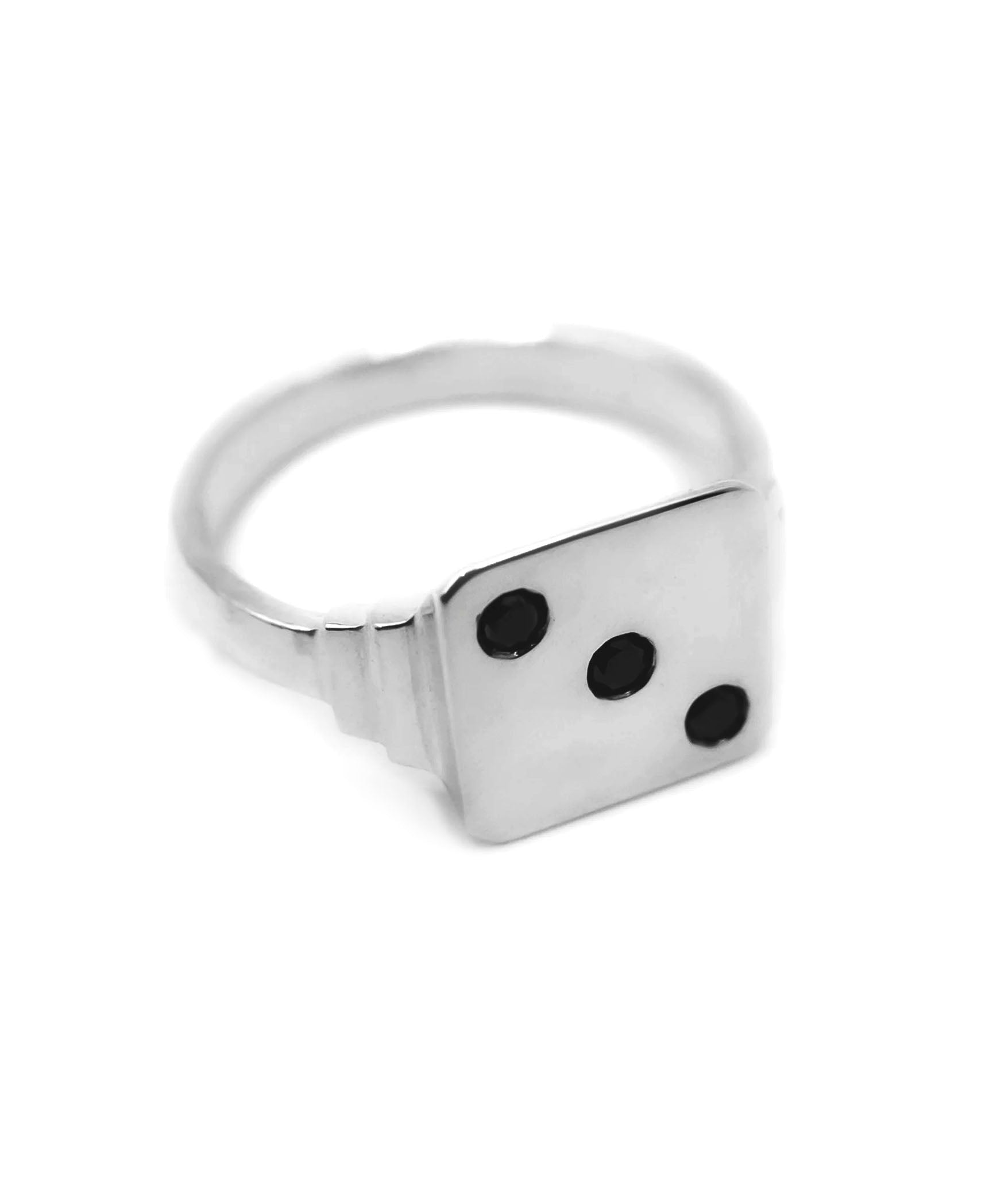 flat lay image of THE HUNT dice signet in sterling silver with 3 small diamonds 