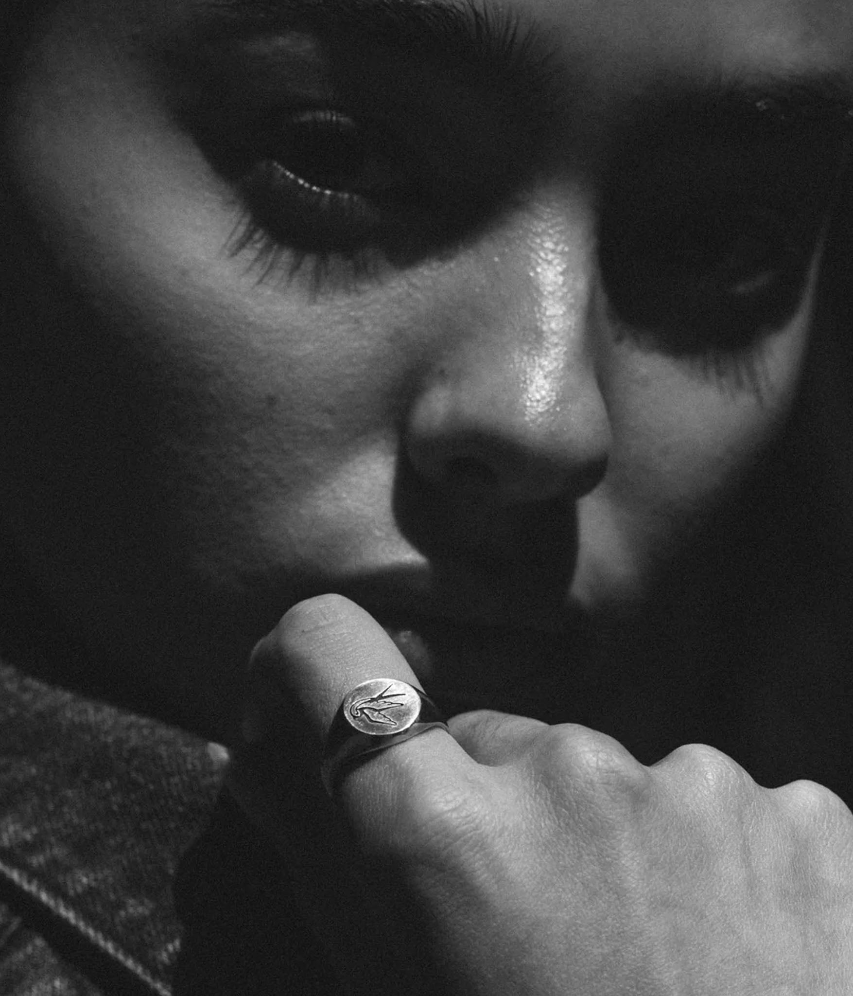 silver swallow signet on female model 