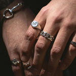 sterling silver rose signet on hand 