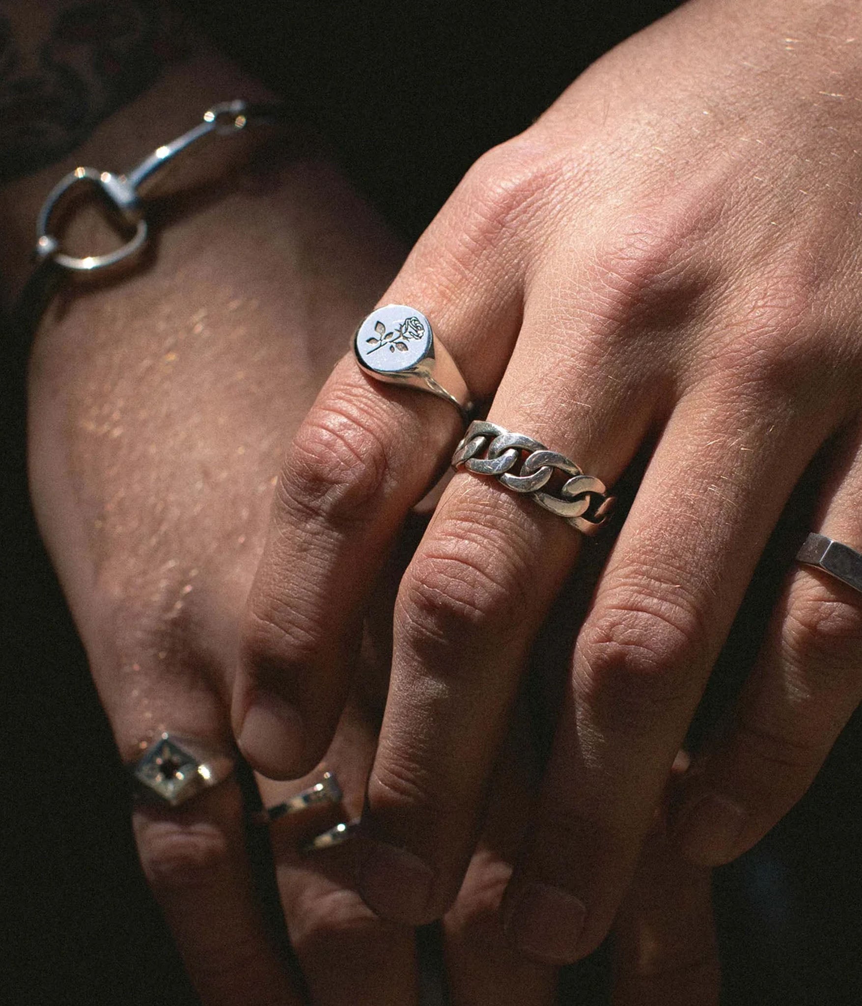 sterling silver rose signet on hand 