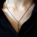 switchblade necklace on model 
