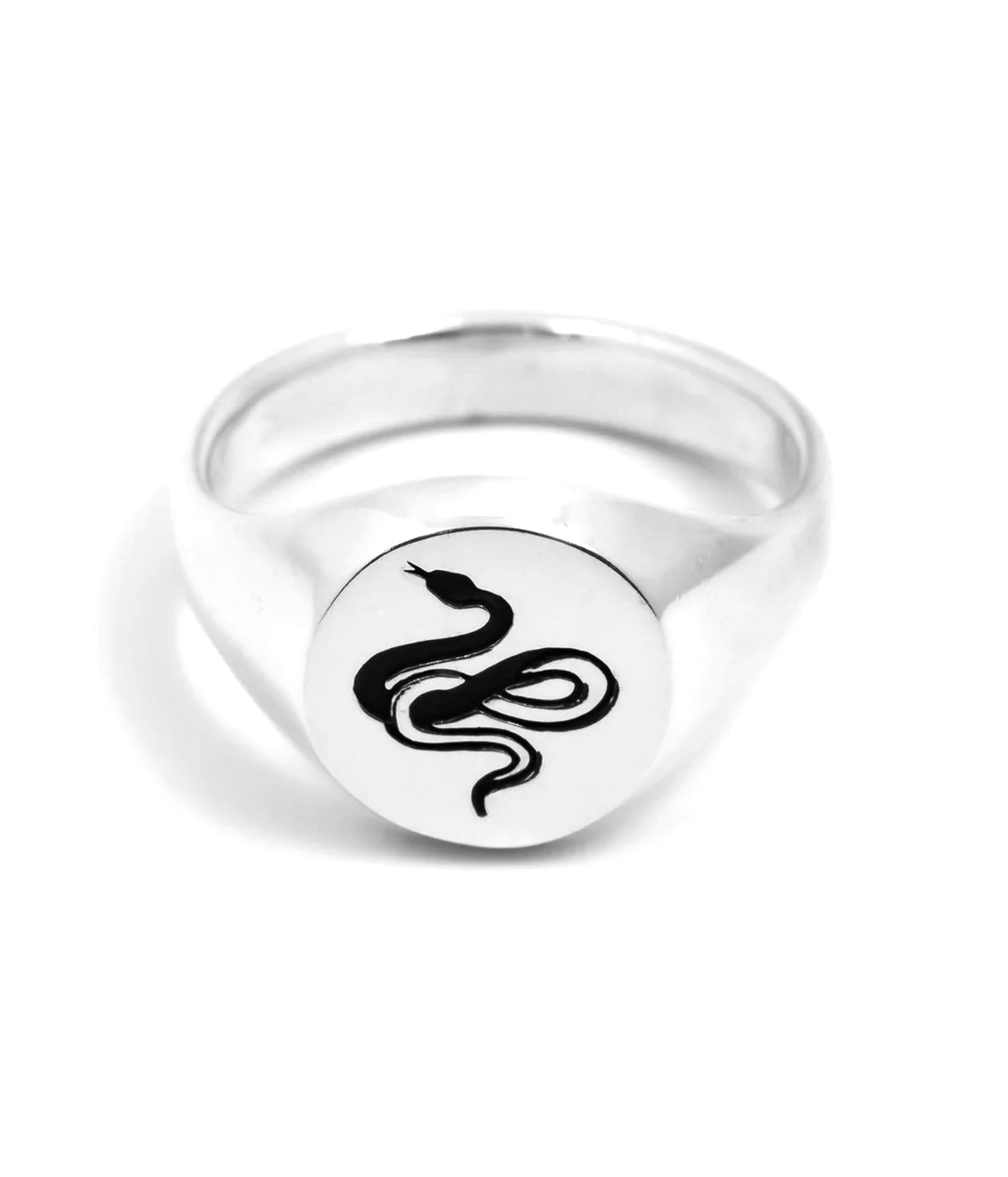 Traditional round sterling silver signet ring with snake engraving by Futaba for The Hunt shot on white background 