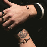 Touch as nails, a strikingly minimalist design defines this bracelet. Its unique and contemporary style serves as a symbol of strength and the celebration of one's individuality