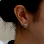Skull Door Knocker Stud earring in lifestyle shot on ear